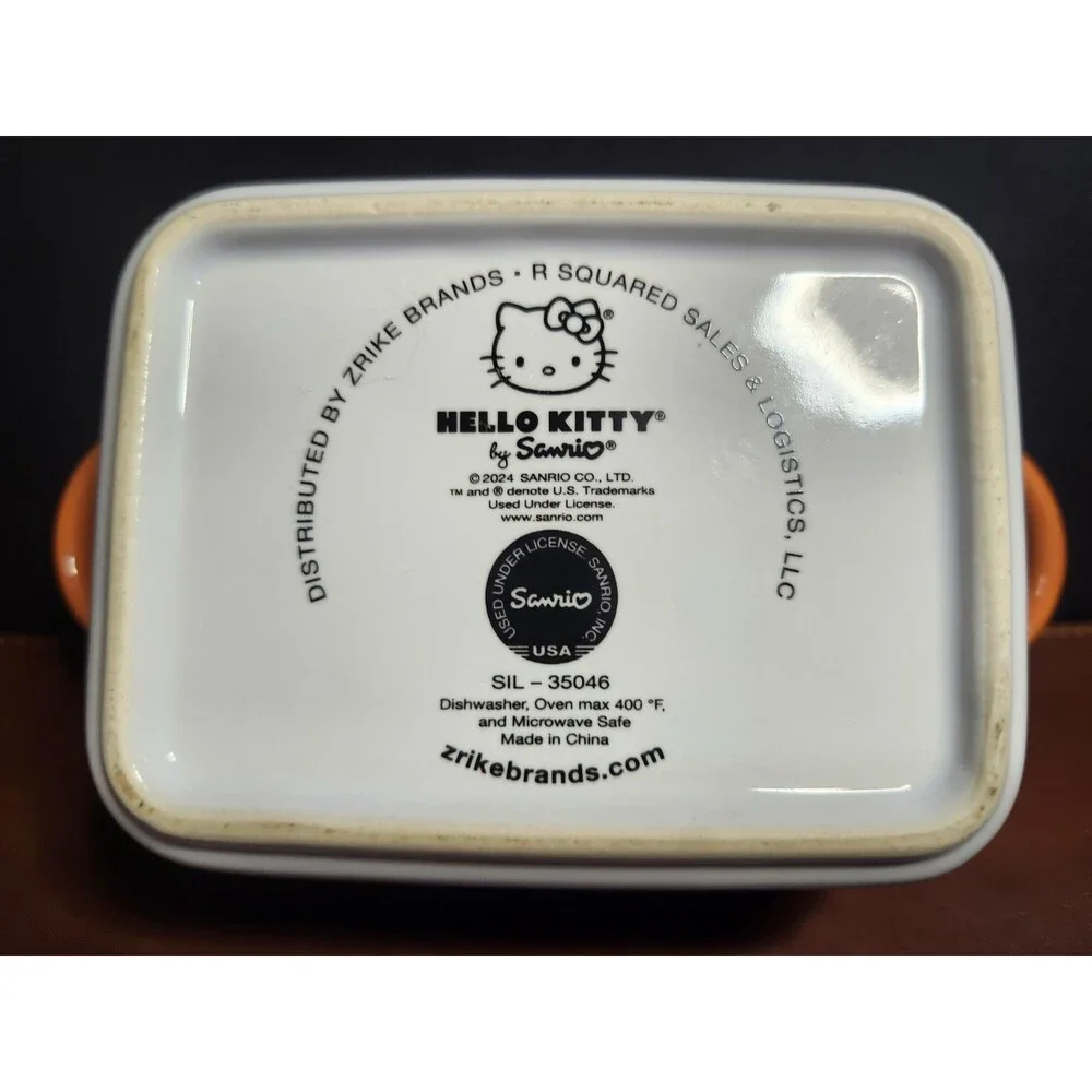 Hello Kitty fall-themed mini loaf pan featuring autumn leaves and vibrant orange